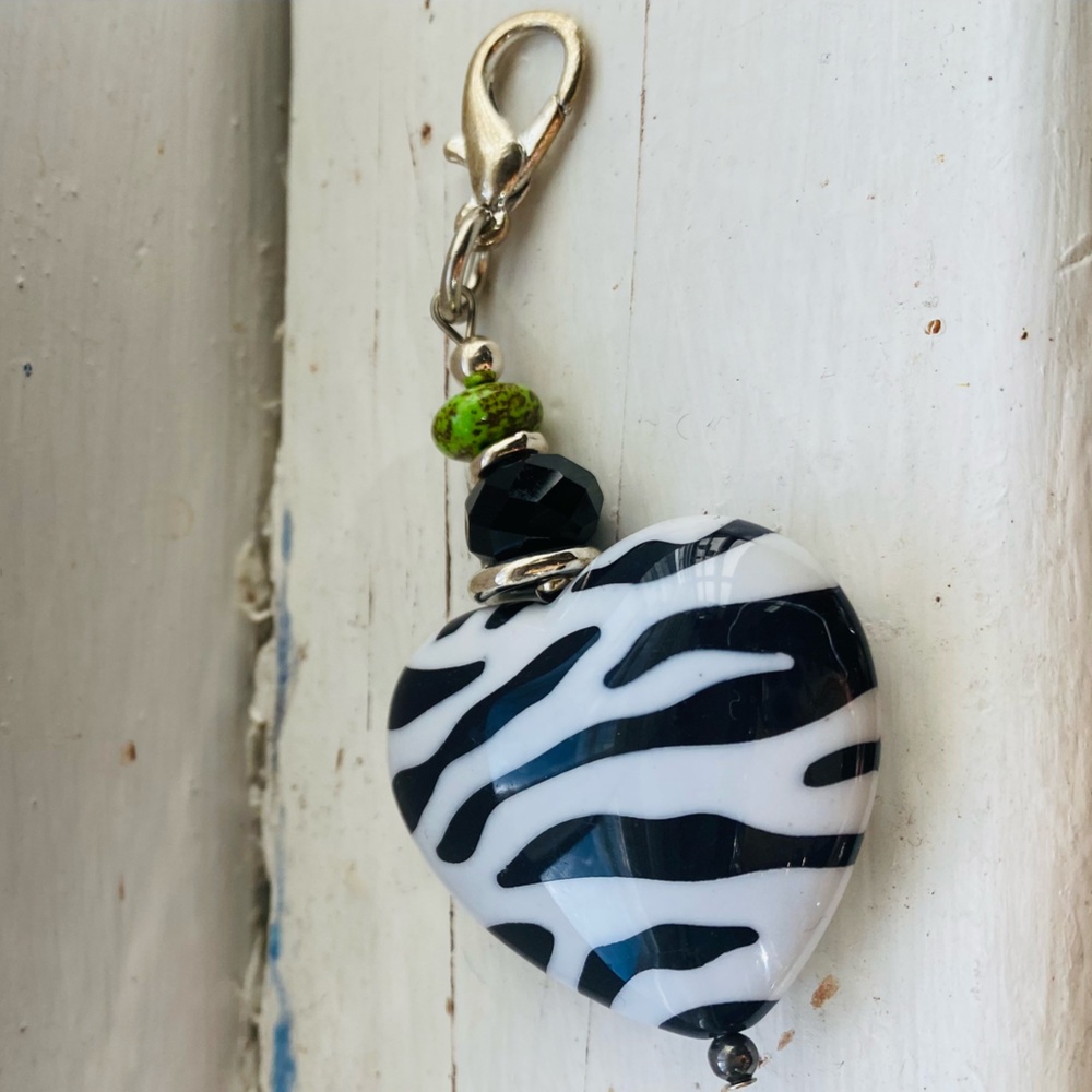 Handcrafted Zebra Print Heart Shaped Charm.